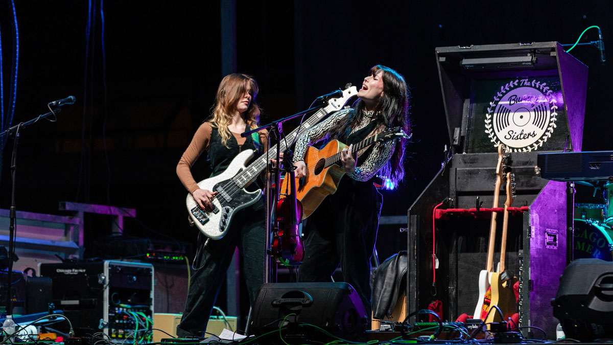 Two women sing on stage at the Little Grassy Get Down.